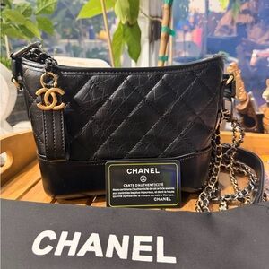 CHANEL Black Crossbody Bag with Gold Accents
